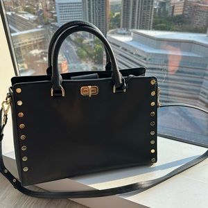 Black and gold studded Michael Kors purse